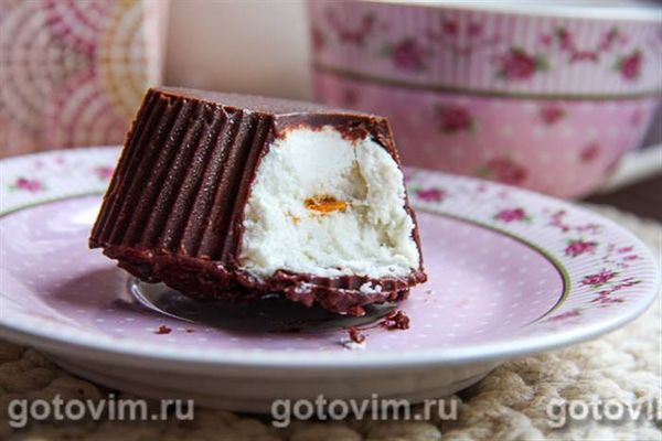 Домашні сирні глазуровані сирки з курагою. Фотографія рецепта